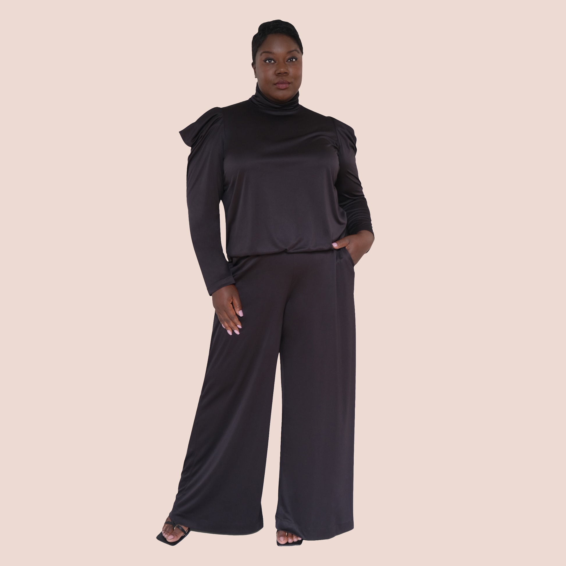 women's long sleeve black turtle neck top sustainable black blouse, eco-friendly black top, ethical fashion black blouse, recycled fabric black shirt, eco-conscious black top, fair trade black blouse, vegan black turtleneck, zero waste black turtleneck, sustainable black dressy top, eco-friendly black party shirt,  ethical black tops for women, green fashion shirt, black top made from recycled materials, sustainable fashion black blouse collection