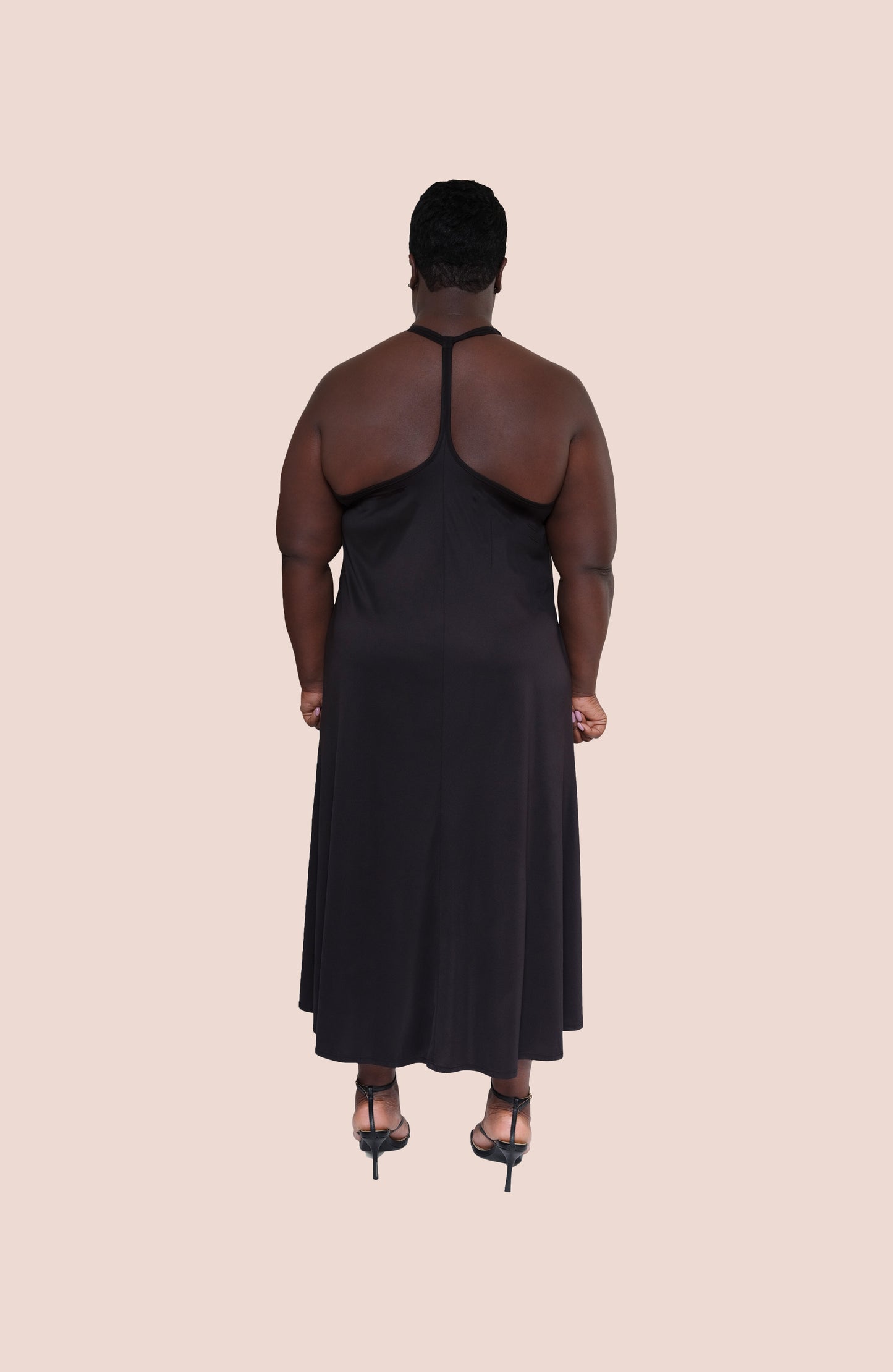 racerback black dress sustainable black dress, eco-friendly black dress, ethical black fashion, recycled fabric black dress, eco-conscious black dress, fair trade black dress, vegan black dress, zero waste black dress, sustainable black evening dress, eco-friendly black party dress, ethical black dress for women, green fashion black dress, black dress made from recycled materials, and sustainable fashion black dress collection