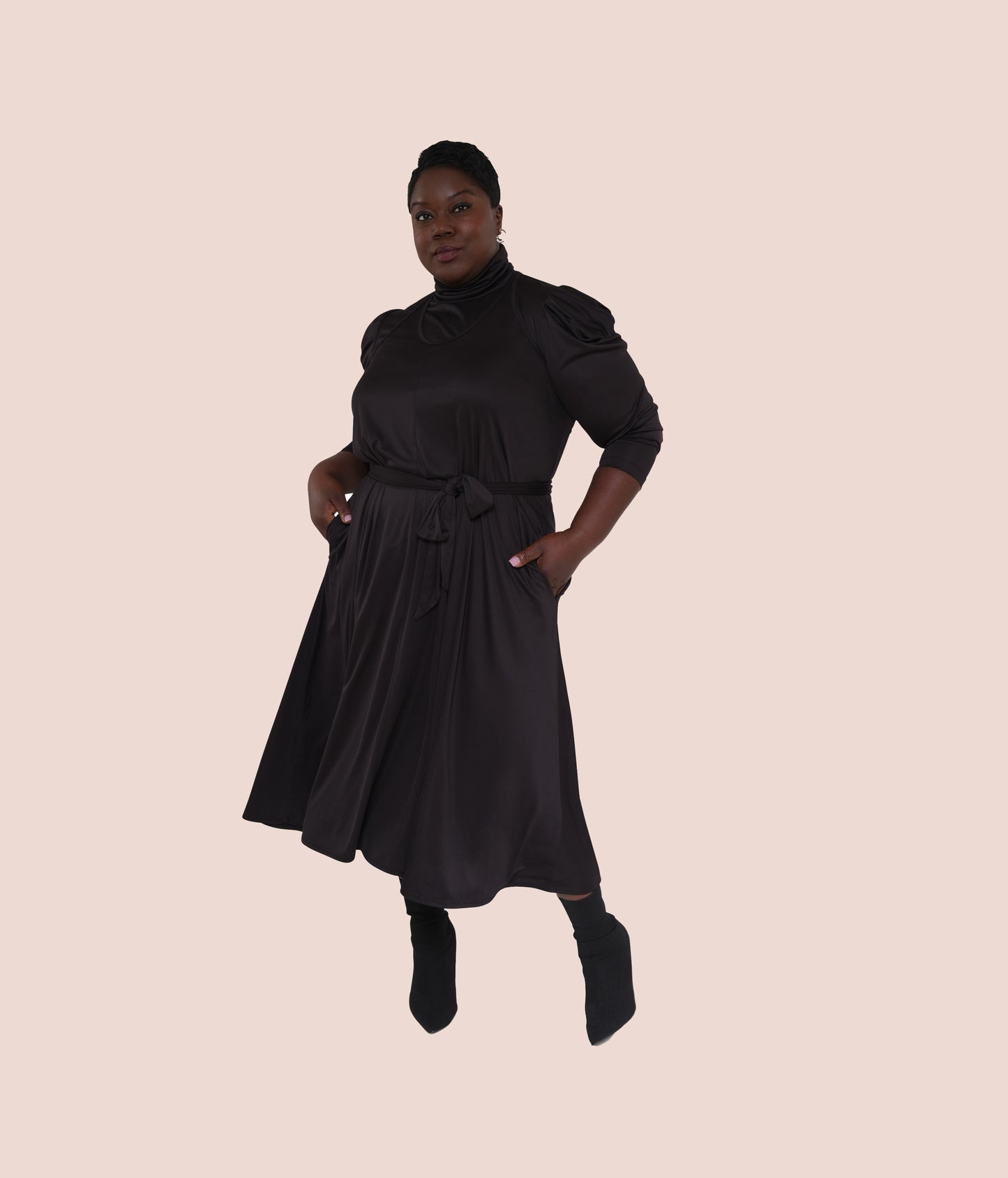 black belted dress sustainable black dress, eco-friendly black dress, ethical black fashion, recycled fabric black dress, eco-conscious black dress, fair trade black dress, vegan black dress, zero waste black dress, sustainable black evening dress, eco-friendly black party dress, ethical black dress for women, green fashion black dress, black dress made from recycled materials, and sustainable fashion black dress collection