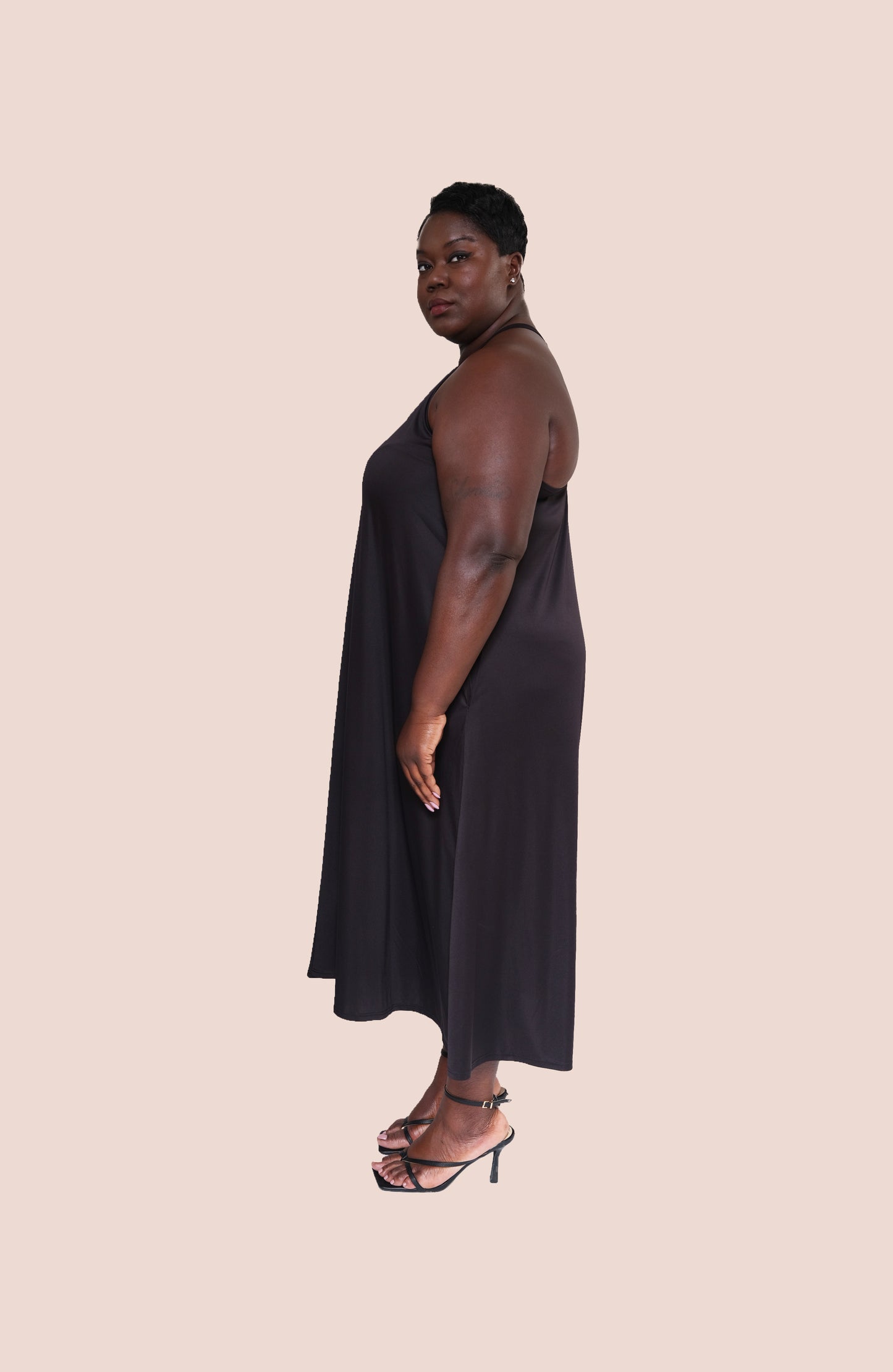 black summer dress sustainable black dress, eco-friendly black dress, ethical black fashion, recycled fabric black dress, eco-conscious black dress, fair trade black dress, vegan black dress, zero waste black dress, sustainable black evening dress, eco-friendly black party dress, ethical black dress for women, green fashion black dress, black dress made from recycled materials, and sustainable fashion black dress collection.